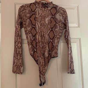 Soft cotton snakeskin bodysuit. Worn once